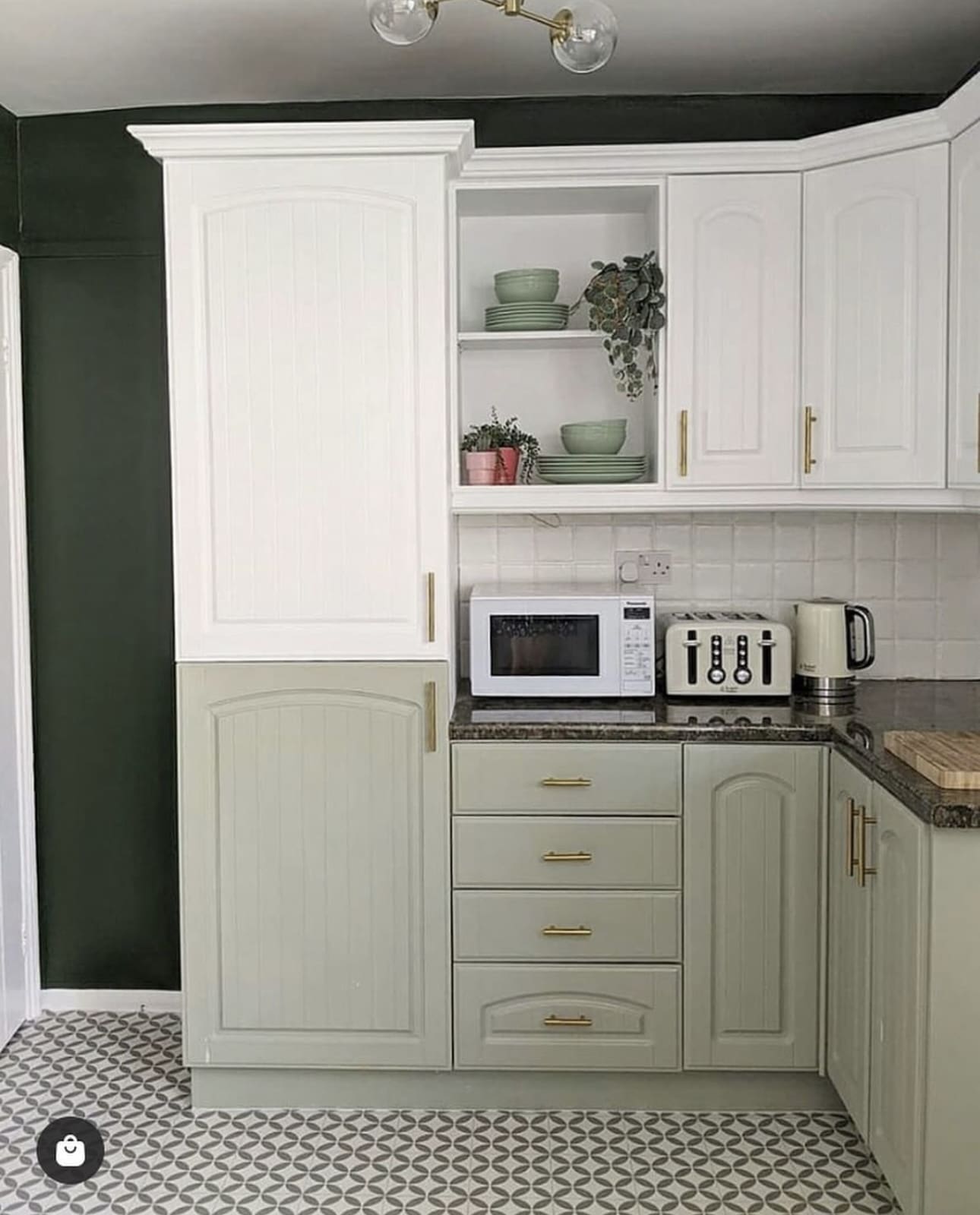 34 Beautiful Sage Green Kitchen Design Ideas to Inspire You 31 34 Beautiful Sage Green Kitchen Design Ideas to Inspire You Sage Green Kitchen Cabinet Against Green Walls