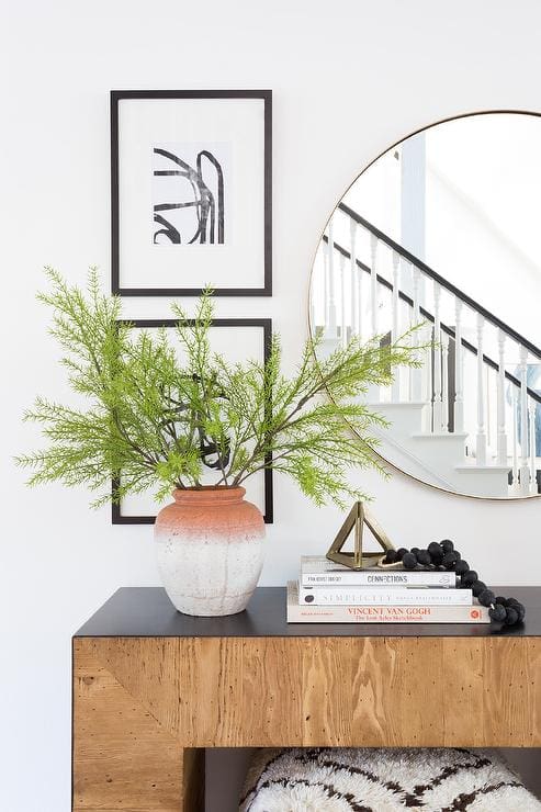 45 Modern and Elegant Entryway Table Decor Ideas 34 45 Modern and Elegant Entryway Table Decor Ideas round gold mirror over chunky wooden console table Entryway Table Decor