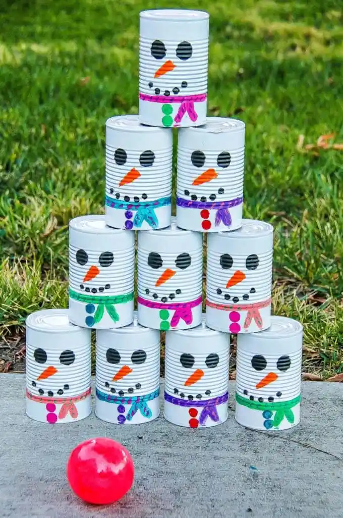 24 Easy & Fun Winter Crafts for Kids of All Ages 66 24 Easy & Fun Winter Crafts for Kids of All Ages Winter snowman tin can toss game Winter Crafts for Kids